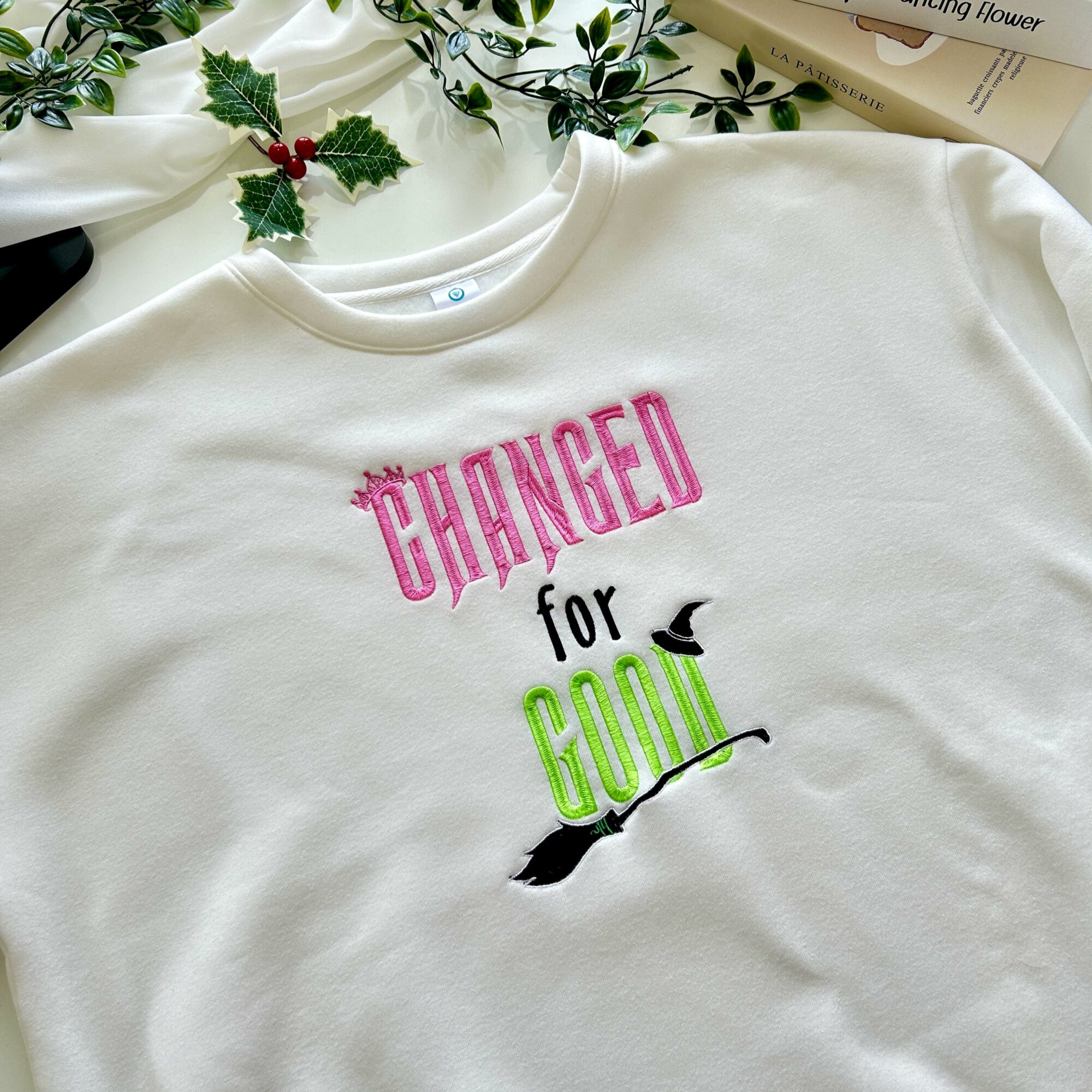 Changed For Good Embroidered Sweatshirt Wand & Broom On Sleeve Hoodie