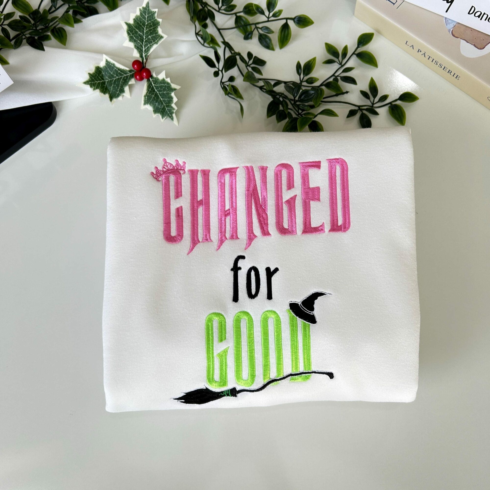 Changed For Good Embroidered Sweatshirt Wand & Broom On Sleeve Hoodie