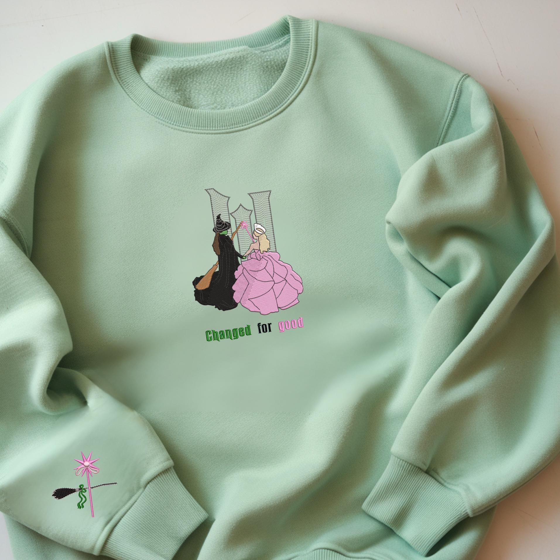 Wicked Change For Good Embroidered Sweatshirt Broom And Wand On Sleeve